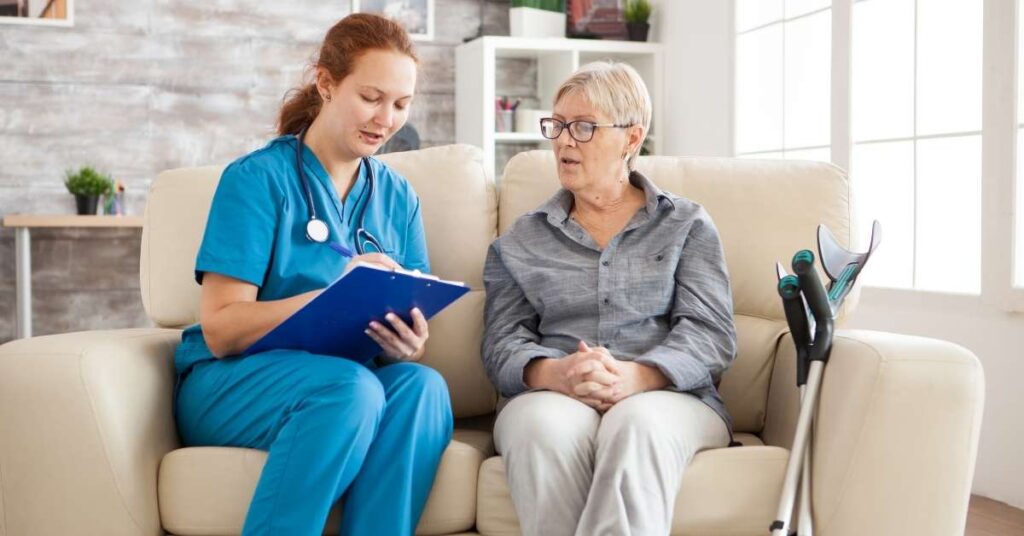 Nurse conducting an in-home assessment for a senior to qualify for home health care under NY Medicaid in New York.